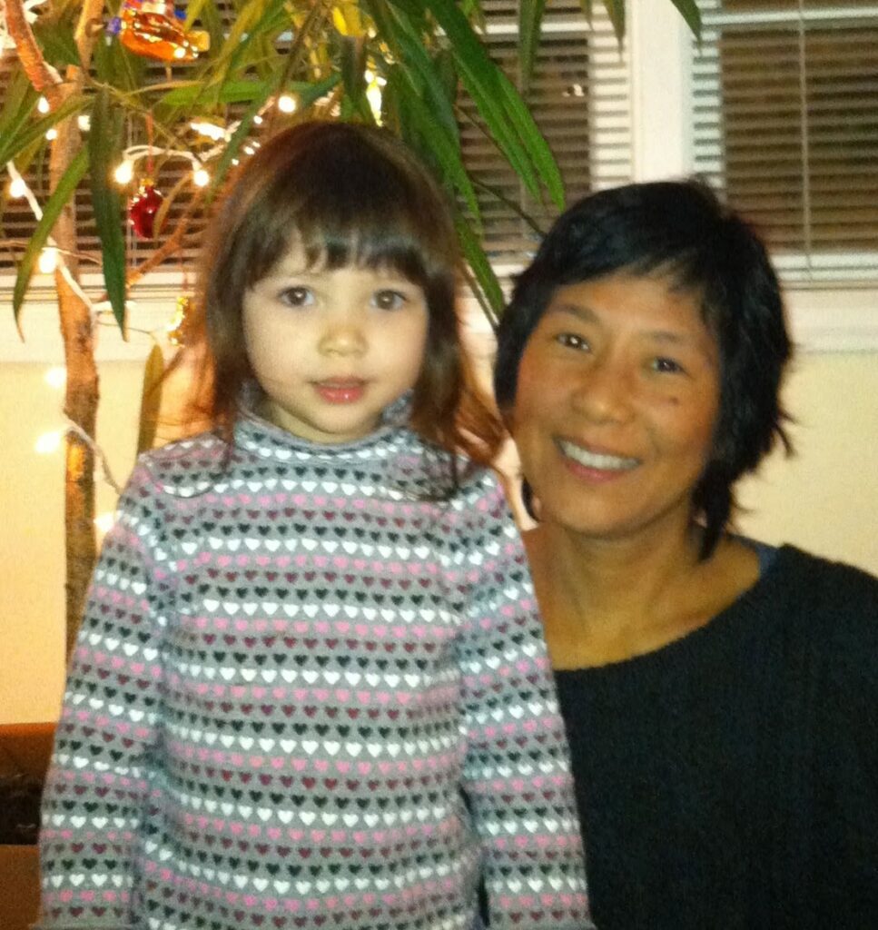 Dr. Chikako Harper with a little girl